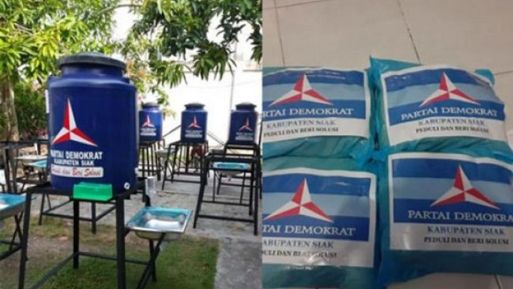 Partai Demokrat Peduli Siak Bagikan Tangki Air Masker dan Cairan Disinfektan Untuk Cegah Covid-19
