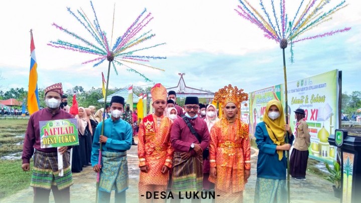 Desa Lukun Meriahkan Pawai Ta'aruf MTQ Ke XI Kecamatan 3T, Berikut Pesan Kades Anwar Desa Lukun Meriahkan Pawai Ta'aruf MTQ Ke XI Kecamatan 3T, Berikut Pesan Kades Anwar