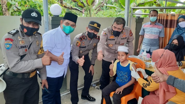 Giat Vaksinasi Massal, Wilkum Polsek Tambang Dikunjungi Tim Polda Riau Giat Vaksinasi Massal, Wilkum Polsek Tambang Dikunjungi Tim Polda Riau