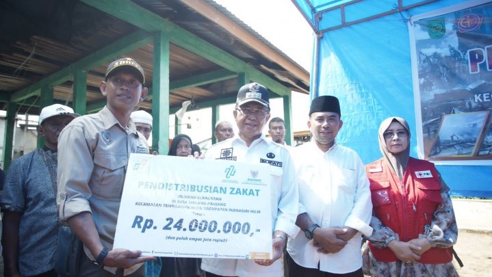 Bupati HM Wardan Minta Masyarakat Tidak Ragu Berzakat di Baznas Bupati HM Wardan Minta Masyarakat Tidak Ragu Berzakat di Baznas